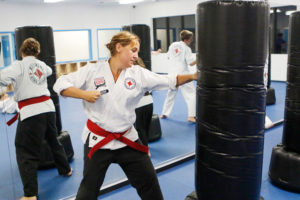 Lara Shuman taking a karate class at Tristar Martial Arts in Westminster. Lara Shuman and her son Maddox, age 8, are red belts and her husband Kyle and son Hayden, age 10, are brown belts at Tristar.
