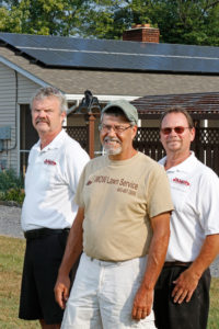 Steve Ensor, at his home in Westminster, with Tim Kyle, owner of Tim Kyle Electric in Westminster, and solar technician Steve Patterson. Ensor had solar panels installed three years ago by Tim Kyle Electric. 